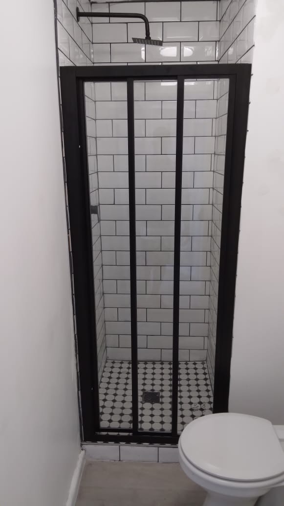 Custom Black Framed Tri Door Shower