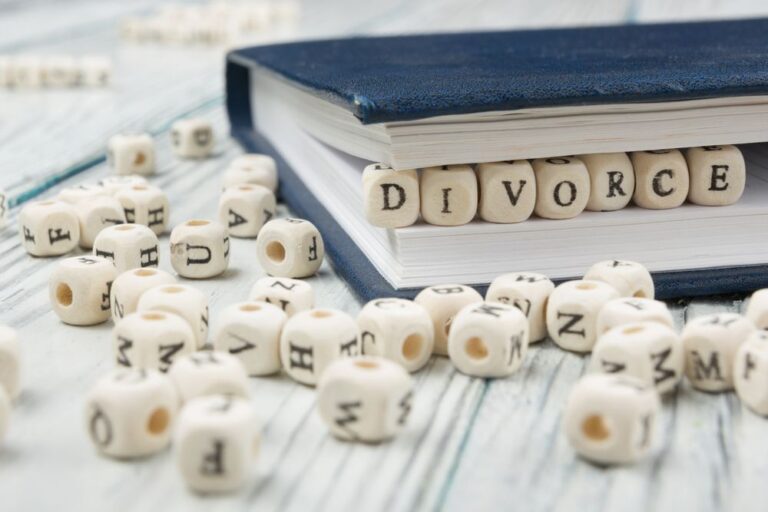 Divorce word written on wood block 768x512