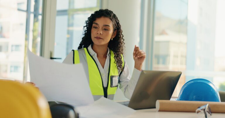 architecture laptop woman with documents blueprint building design floorplan construction civil engineer person computer planning research project with paperwork 1 768x405
