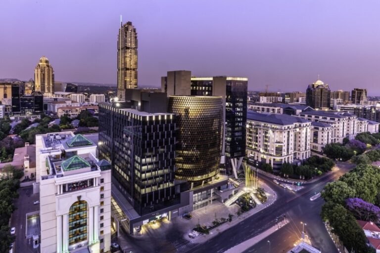 Sandton City panoramic at dusk with the Leonardo building iStock 1180054044 768x512